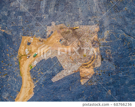 Aerial top view photo from flying drone of large garbage pile. Garbage pile in trash dump or landfill. Environmental pollution 68766236