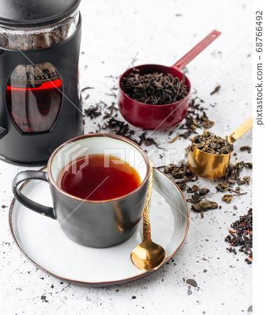 Tea set with spoons and a cup Tea set with spoons and a cup 68766492