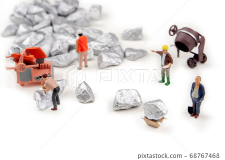 digging silver, platinum ore on white background 68767468