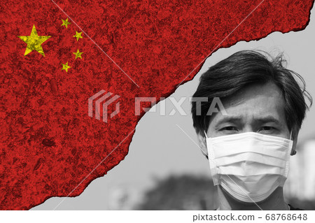 Cracked painted concrete walls of China flag and black & white of masked man prevent germs. 68768648