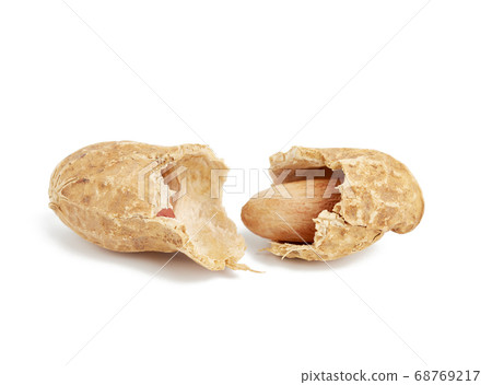 inshell peanuts broken in half, food isolated on 68769217