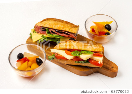 French bread tomato cheese sandwich French bread tomato cheese sandwich 68770023