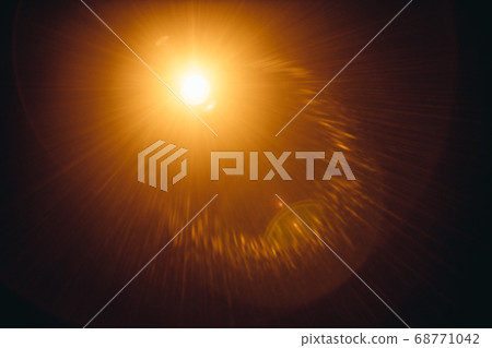 Abstract Natural Sun flare on the black Abstract Natural Sun flare on the black 68771042