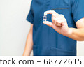 Man with vaccine 68772615
