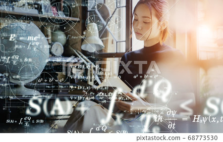 Science image Woman reading a book Science image Woman reading a book 68773530