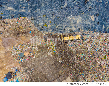 Aerial top view photo from flying drone of large garbage pile. Garbage pile in trash dump or landfill. Environmental pollution 68773542