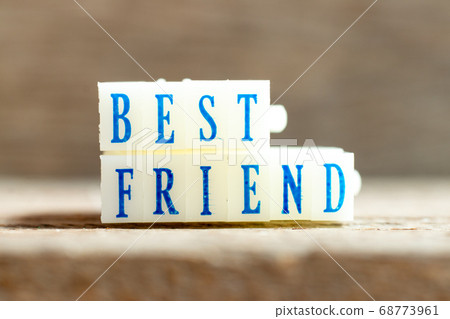 Letter block with blue color word best friend on wood background Letter block with blue color word best friend on wood background 68773961