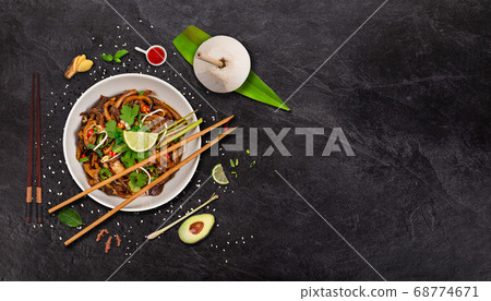 Udon noodles asian food background on rustic stone 68774671