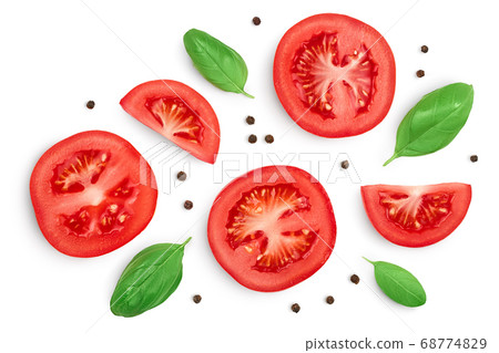 Tomato slices with basil and peppercorns isolated on white background. Clipping path and full depth of field. Top view. Flat lay Tomato slices with basil and peppercorns isolated on white background. Clipping path and full depth of field. Top view. Flat lay 68774829