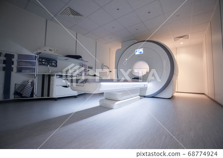 A sophisticated MRI Scanner at hospital. MRI machine. Hospital interior. 68774924