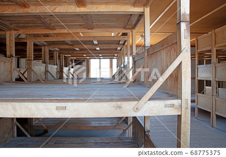 Dachau concentration camp, wooden beds Dachau concentration camp, wooden beds 68775375