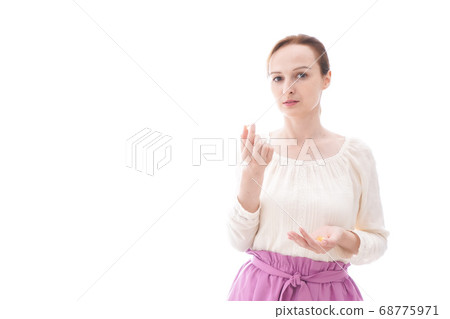 Smiling young woman drinking supplements 68775971