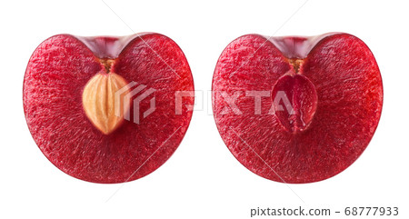 Isolated cherry halves with and without kernel Isolated cherry halves with and without kernel 68777933