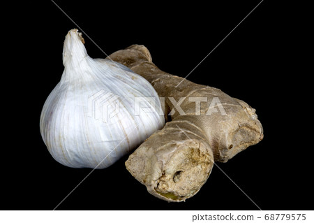 Garlic and Ginger on a Black Background 68779575