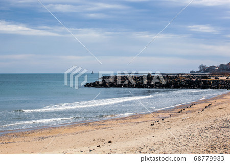 Beach And Sea In Bright Sunlight Beach And Sea In Bright Sunlight 68779983