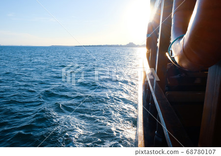 Sailing With A Small Cruise Ship Near The Coast Of Sailing With A Small Cruise Ship Near The Coast Of 68780107