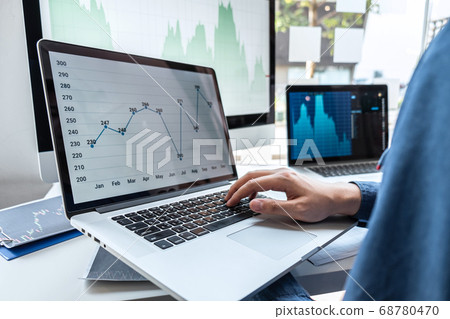 Businessman investor working in traders marketing 68780470