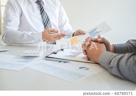 Two business partner team meeting and discussion 68780571