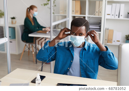 African Man Wearing PPE at Workplace in Office 68781052