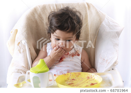 Little cute child celebrating her first birthday Little cute child celebrating her first birthday 68781964