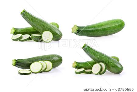 fresh green zucchini with slice on white fresh green zucchini with slice on white 68790696