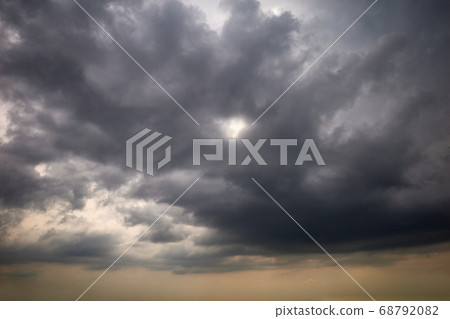 Gloomy clouds in the infernal sky Gloomy clouds in the infernal sky 68792082