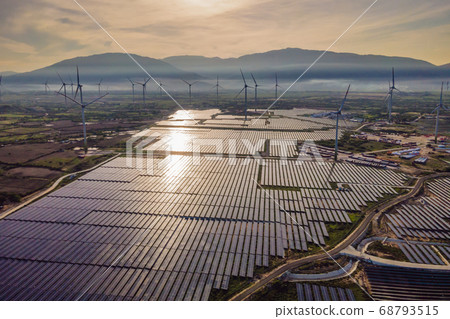 solar energy panels and wind turbine. Drone view 68793515
