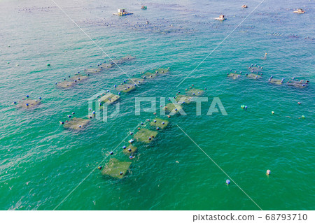 Lots of marine farms in a blue sea water. Sea farming concept Lots of marine farms in a blue sea water. Sea farming concept 68793710