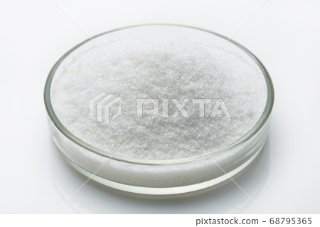 hydro-gel in glass, powder on a white surface hydro-gel in glass, powder on a white surface 68795365