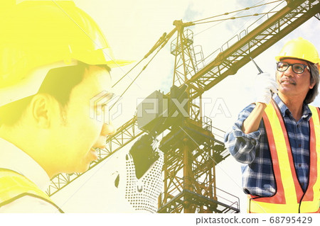 group of engineers using radio communication in big construction site with construct crane group of engineers using radio communication in big construction site with construct crane 68795429