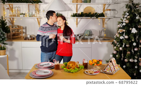 cheerful family couple drinks champagne hugs showing love 68795622