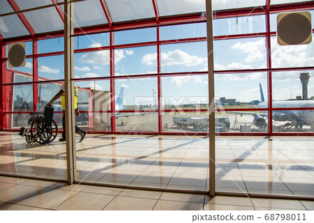 Cuba View from the waiting lobby of Jose Marti International Airport Control tower and airplane 68798011