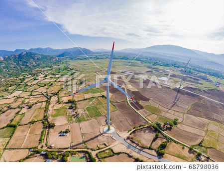 solar energy panels and wind turbine. Drone view 68798036
