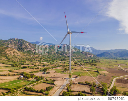 solar energy panels and wind turbine. Drone view 68798061