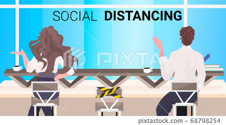 rear view cafe visitors keeping distance to prevent coronavirus epidemic social distancing concept rear view cafe visitors keeping distance to prevent coronavirus epidemic social distancing concept 68798254