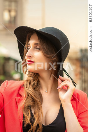 Side view of fashionable young woman. Side view of fashionable young woman. 68801197