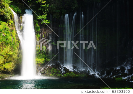 Mt. Fuji's summer waterfall Shiraito no Taki, silky water flow Mt. Fuji's summer waterfall Shiraito no Taki, silky water flow 68803100