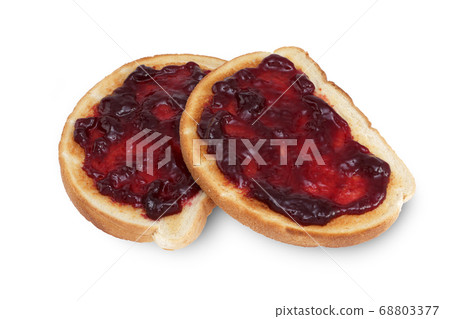 Two slices of toast with raspberry jam jelly Two slices of toast with raspberry jam jelly 68803377