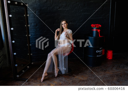 Bride morning preparation. Beautiful young woman 68806416