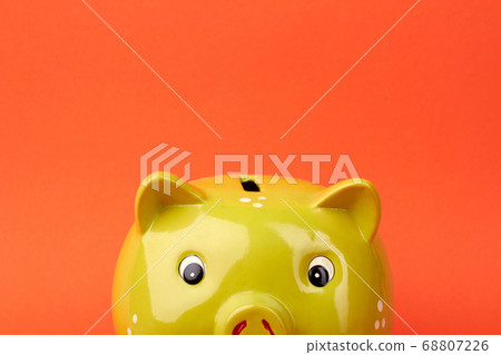 Ceramic yellow piggy bank. Ceramic yellow piggy bank. 68807226