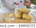 Chef and Ingredients to make mashed Potatoes 68808155