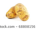 Unpeeled raw potatoes 68808156