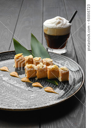 Sherbet with nuts, caramel and peanut flakes Sherbet with nuts, caramel and peanut flakes 68808723