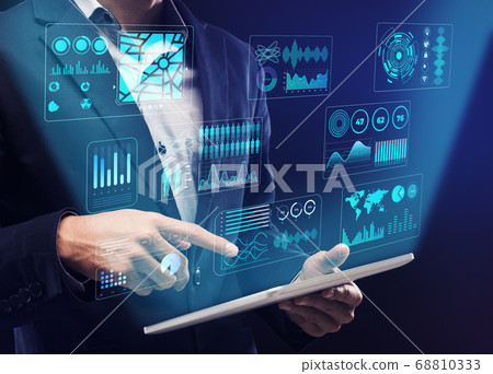 Businessman using digital tablet with interactive board Businessman using digital tablet with interactive board 68810333
