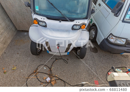 Charging Small EV Charging Small EV 68811480