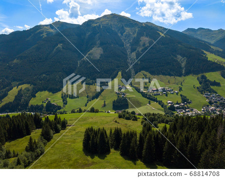 Aerial view from Hinterglemm to Saalbach on a summer day in the Alps at Saalbach-Hinterglemm, Austria Aerial view from Hinterglemm to Saalbach on a summer day in the Alps at Saalbach-Hinterglemm, Austria 68814708
