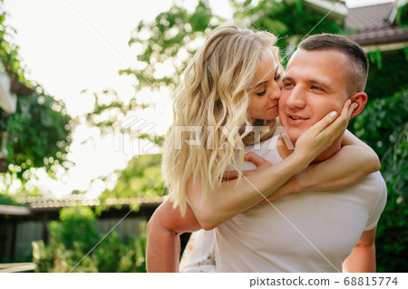 beautiful and happy couple having fun in garden. 68815774