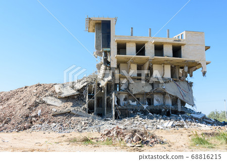 Half-destroyed building due to illegal development 68816215