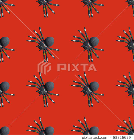 Seamless pattern with black spiders on a red background. Halloween theme. Simple drawing for any surface. 68816659