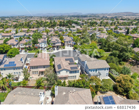 Aerial view of middle class subdivision neighborhood with residential villas next to each other. 68817436